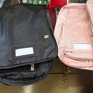 BEIS packing cubes, three sets, one pink and two black. Can be sold separately.